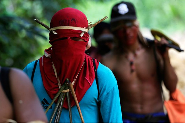 1_amazon-indians-strip-tie-beat-illegal-loggers (5).jpg