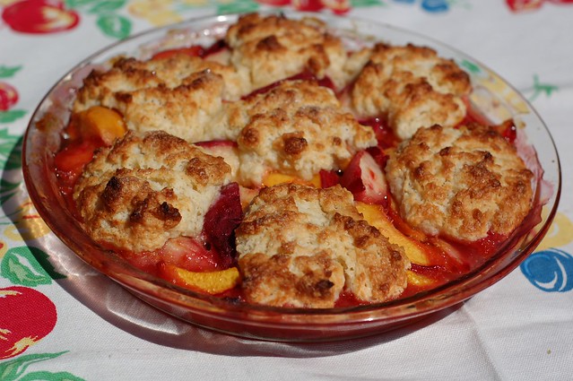 Fresh peach cobbler with biscuit topping