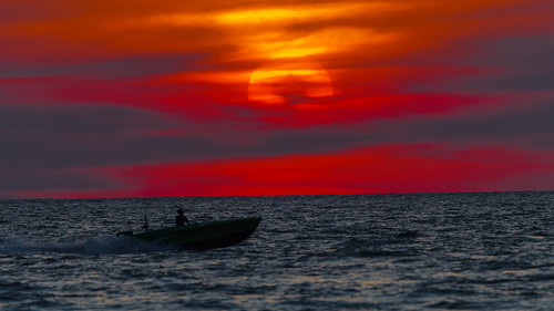 malaysia travel scenery scene sea sunset 300mmf4epfedvr 300mm water outdoor sun boat d500 nikon nikkor nature ngc moody red clouds cloud redsky
