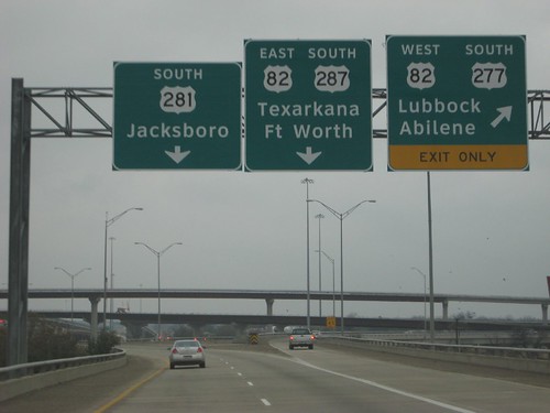 signs west drive highway scenery texas tour overpass scene tourist views multiple sights divide lanes decisions westward
