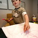 "this is a pink airport"   nick, making a shirt for sean    MG 7866
