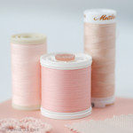 Peach sewing thread
