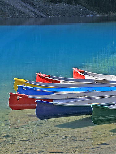blue lake nature water reflections landscape boats scenery view canoes banff morainelake