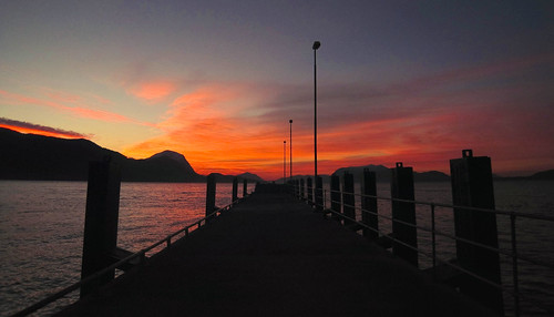 blue sunset red sky orange mountains nature yellow norway clouds contrast dark landscape vanishingpoint wideangle explore wharf fjord lightpole redsunset sykkylven canonixus850is