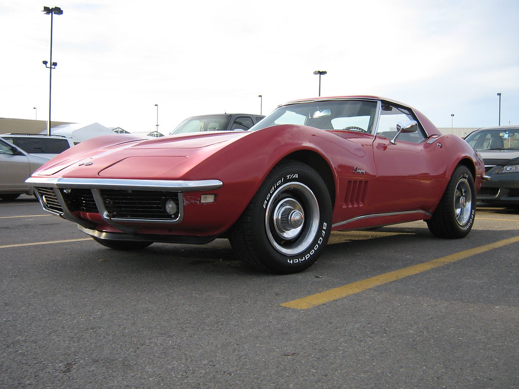Image of a red painted 1969 Corvette Stingray hard top.