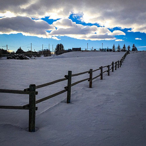 clouds sunset fence snow hill alberta calgary