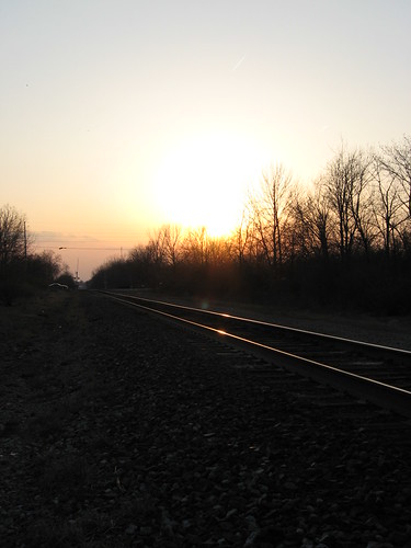 trees sun reflection set cn dusk tracks indiana canadian national rails valpo