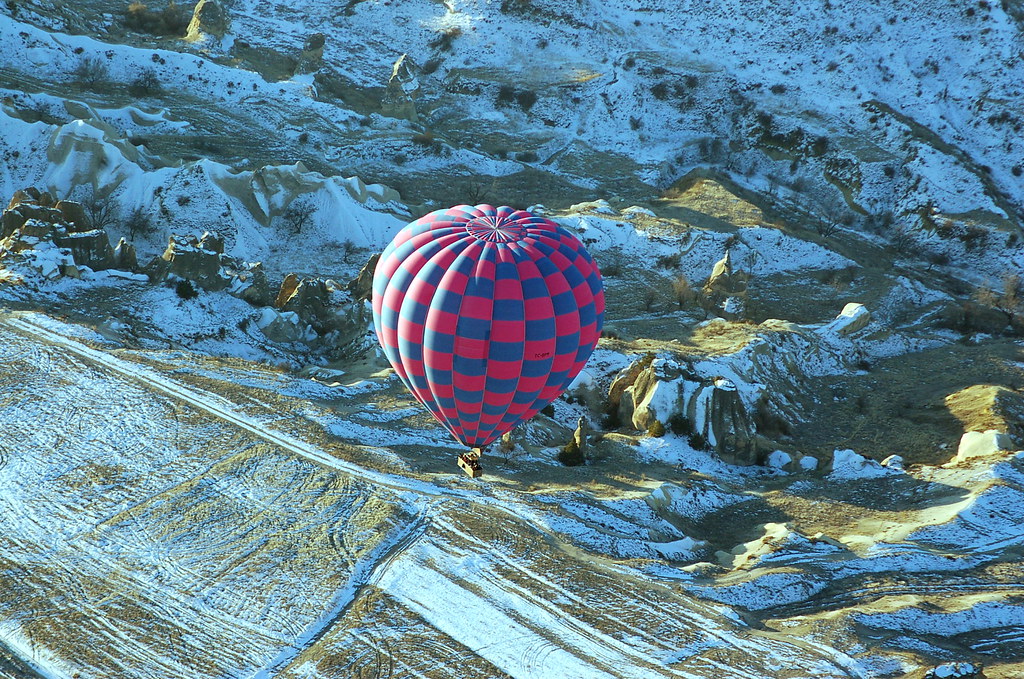 Hot Air Balloon Ride over a Snow Covered Cappadocia