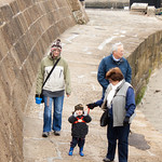Walking along the harbour wall at Lyme Regis