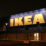 An Ikea illuminated at night.