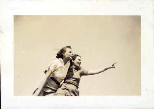 Two Women pointing