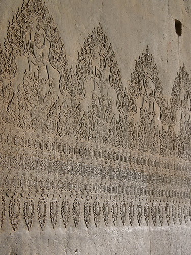Carvings in the wall of Angkor Wat