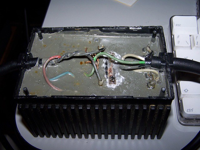 c64 PSU filled with some kind of epoxy glue