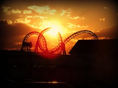 sunset over roller coaster