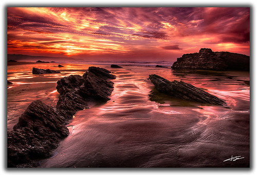sea sun color colour sol beach rock canon de landscape mar asturias playa paisaje aviles puesta roca 1022 verdicio 40d ltytr2 ltytr1