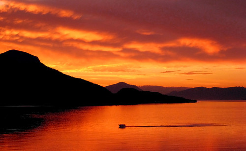sunset red sky orange nature silhouette yellow norway clouds dark landscape golden evening boat warm sykkylven canonixus850is anawesomeshot