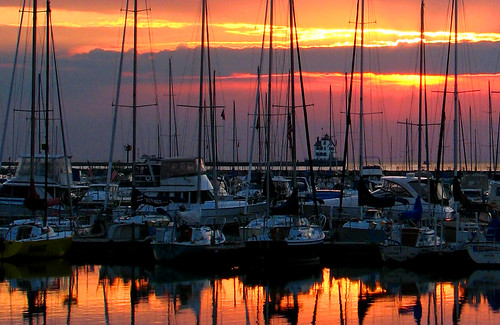 sunset summer sky sun lighthouse sailboat marina boats boat lakeerie greatlakes lorain impressedbeauty
