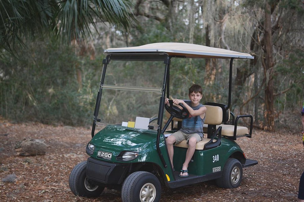 Oliver loves a good golf cart - really he loves anything with a motor and wheels that he's allowed to drive. Florida: 👏