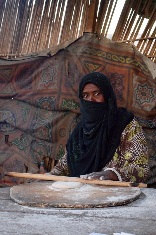 Bedouin woman baking