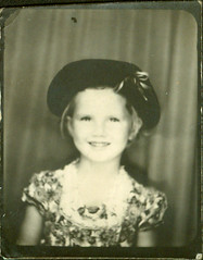 Photobooth Girl with hat in print dress