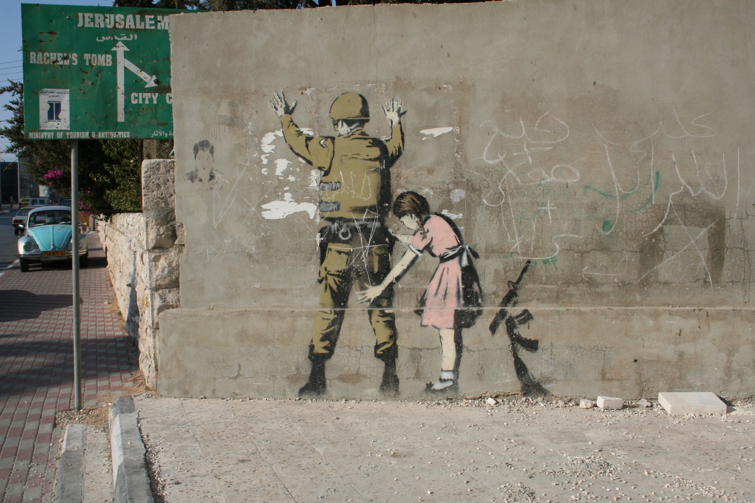 Graffiti by Banksy in the Israeli-occupied Bethlehem ...