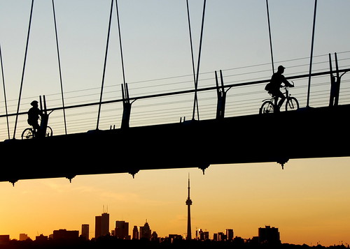 city bridge sky toronto bike bicycle silhouette skyline sunrise buildings dawn cyclist cntower rider 18200mm humberbaybridge beaterbikeblogto
