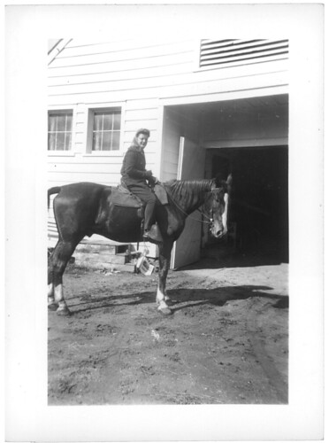 girl on horse by barn 03 030