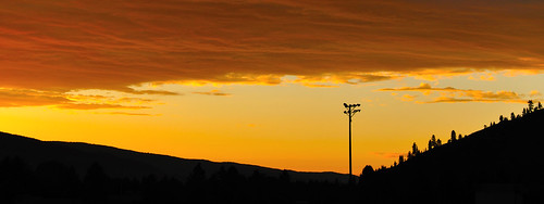 sunset sky orange silhouette clouds washington wa lightpole kettlefalls 06122011