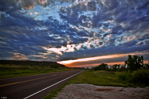 road travel sunset sky oklahoma yellow clouds evening highway horizon roadtrip line lonely roadside reddirt gulmidtstripe glossmountains