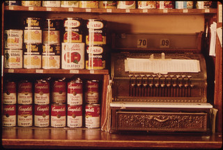 Old Style Cash Register and Canned Goods in a Butcher Shop in New Ulm, Minnesota ..., 10/1974