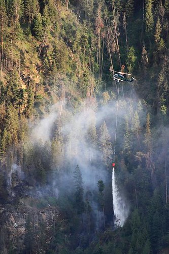 trees red white mountain green forest landscape fire flying smoke canyon helicopter waterbombing