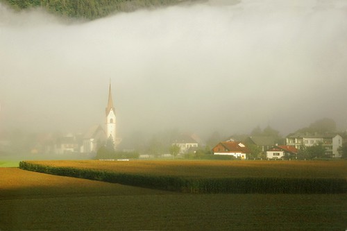 austria österreich earlymorning fog landscape valley alpine mountains church village dream oarsquare cate copenhaver