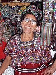 Vendedora de huipiles - Embroidered shirt vendor; Nebaj, Quiché, Guatemala