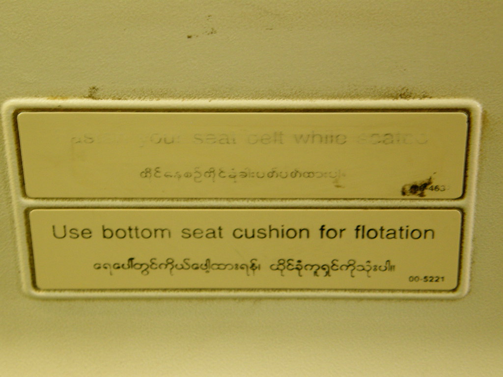 "Use Bottom Seat Cushion for Flotation" Sign on Yangon Airways
