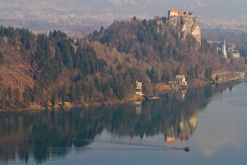 slovenia bled lake reflection castle lakebled boat serene outdoor canon 7d 70200mm peaceful calm water travel europe bledcastle blejskigrad