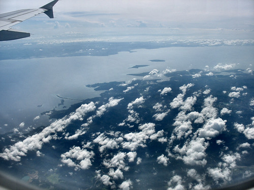 sea water clouds plane airplane islands view air philippines aerialview aerial shrouded