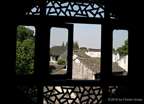 china wood old city roof house building tree heritage geometric window water garden town canal carved ancient downtown view traditional chinese bluesky center carving form prc channel waterway jiangsu peoplesrepublicofchina tongli shuixiang chinesevenice