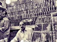 Two Local Lahori Men Manning the Women Bangles and Henna Shop Outside Wazir Khan Masjid | Pakistani Women Will Buy New Henna and Wearing New Colourful Bangles During Special Festivals like Eid-ul Azha & Eid-ul Fitr | Wazir Khan Market, Lahore | Punjab
