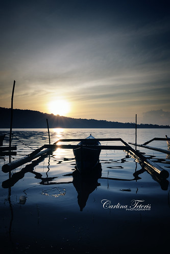 morning blue bali lake reflection water silhouette sunrise indonesia boat sunrays bedugul 2470mm28 mondayblues puraulundanu nikond700 gettyvacation2010