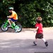 little brother chasing big brother on his bicycle    MG 7533