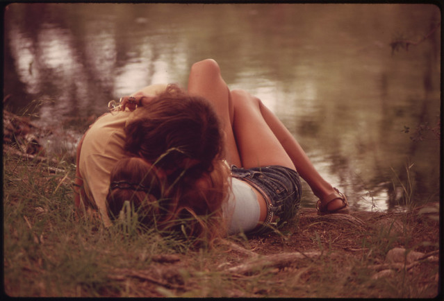 Teenage Couple Embrace on the Bank of the Frio Canyon River near Leakey, Texas, and San Antonio 05/1973