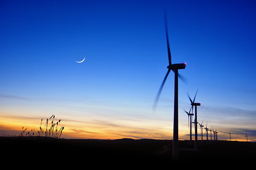 blue sky orange moon windmill silhouette night clouds twilight wind generator campo windfarm