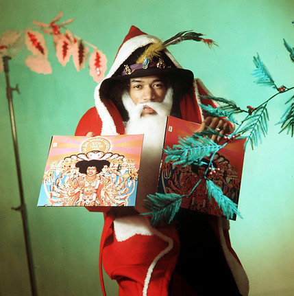 Jimi Hendrix as Father Christmas for the music paper Disc by Dezo Hoffman 1967