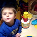 demonstrating the thunderbird 3 rocket silo he constructed at daycare from plastic cups, ketchup and margarine containers   DSC03236