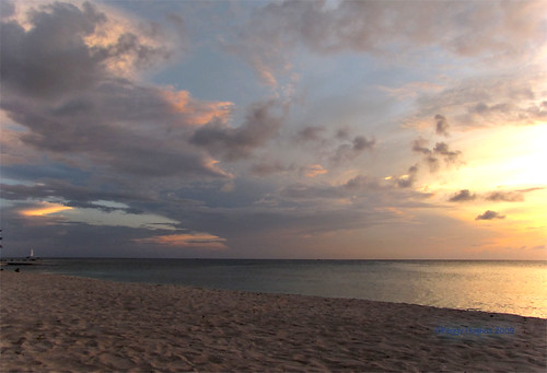 ocean sunset sea vacation fab sky beach clouds caribbean peggy caymanislands allrightsreserved grandcayman sevenmilebeach naturesfinest blueribbonwinner omot qualitypixels ©peggyhughes2009