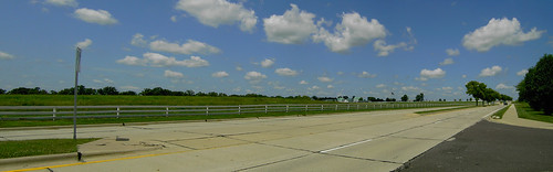 road trees sky grass clouds fence concrete illinois median peoria weaverfarm orangeprairieroad