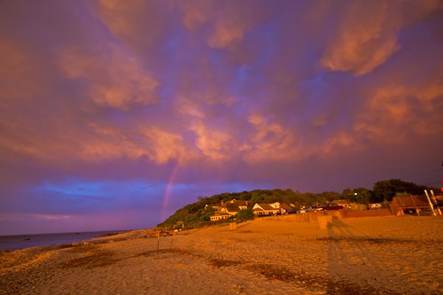 sunset sky beach clouds rainbow
