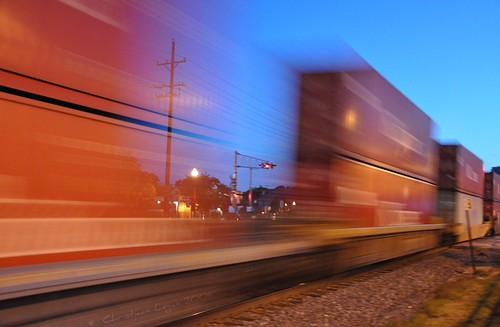 blue summer sky orange blur speed train lights evening crossing transport traintracks tracks fast 71 explore wires shipping containers wheaton shippingcontainers wheatonil 1stplacef2fchallenge 28june2009