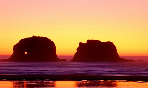 ocean sunset water silhouette rock stone oregon coast pacific rockawaybeach twinrocks