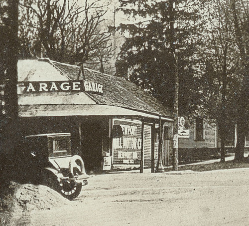 usa signs history cars advertising garage bridges indiana streetscene newport transportation porch shops roads storefronts automobiles businesses realphoto vermillioncounty hoosierrecollections
